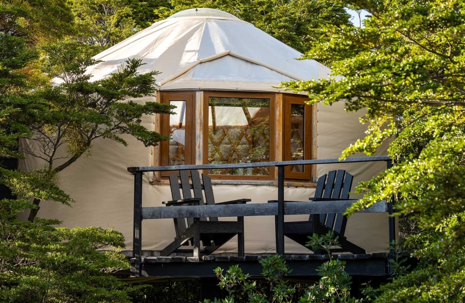 Exterior of a private suite at Patagonia Camp with views of Patagonian nature